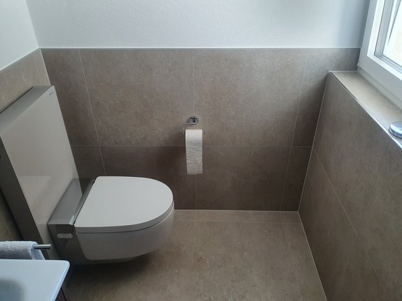 Badumbau mit Plattenbelägen